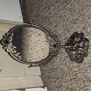 A mini two-faced mirror